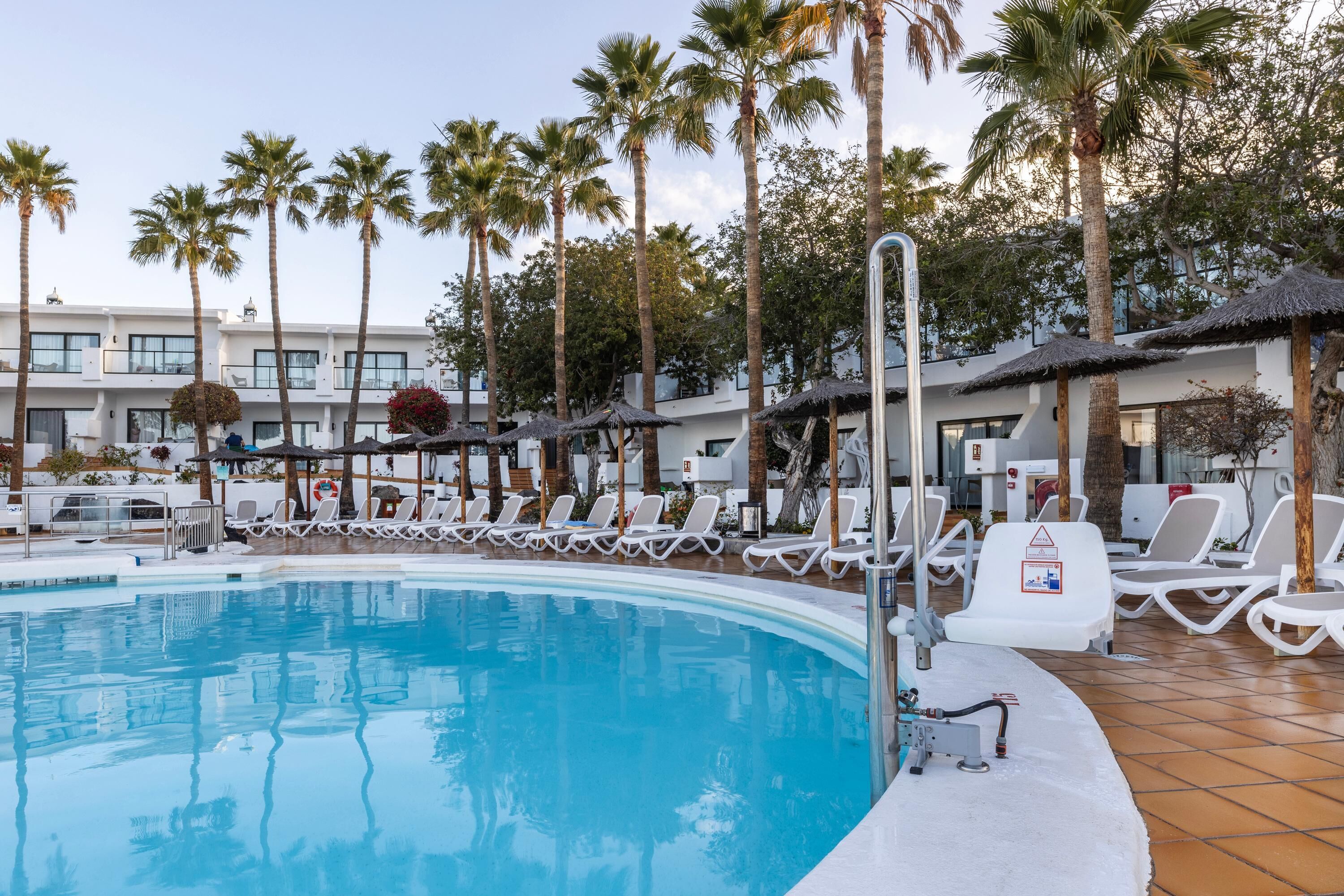 2 outdoor pools, pool umbrellas, pool loungers