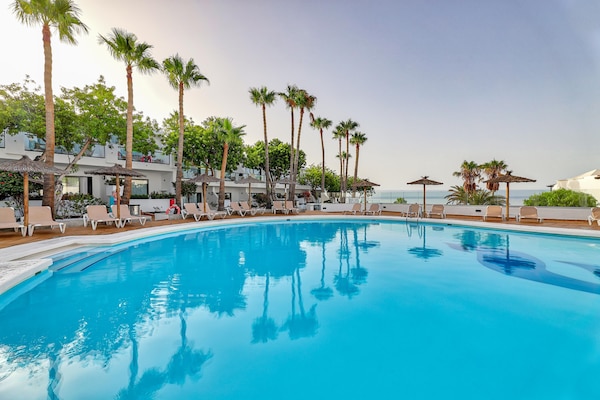 2 outdoor pools, pool umbrellas, sun loungers