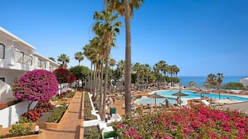 2 outdoor pools, pool umbrellas, pool loungers
