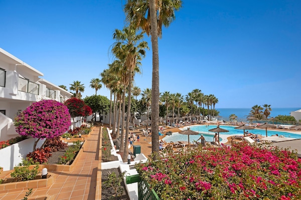 2 outdoor pools, pool umbrellas, pool loungers
