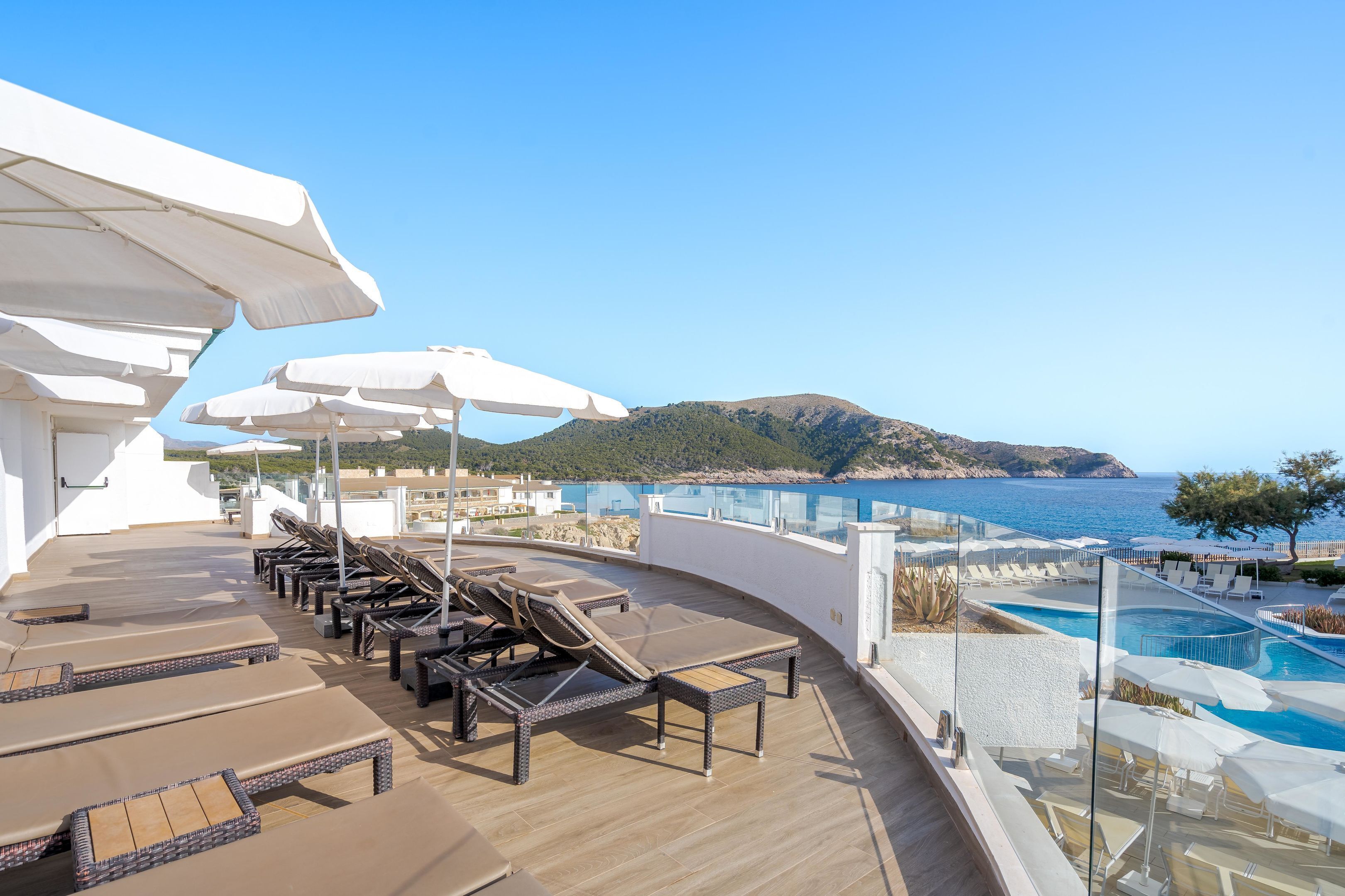 Indoor pool, outdoor pool, pool umbrellas, sun loungers