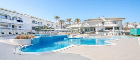 Indoor pool, outdoor pool, pool umbrellas, sun loungers