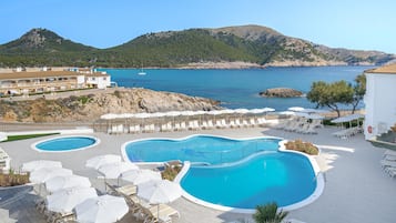 Indoor pool, outdoor pool, pool umbrellas, sun loungers