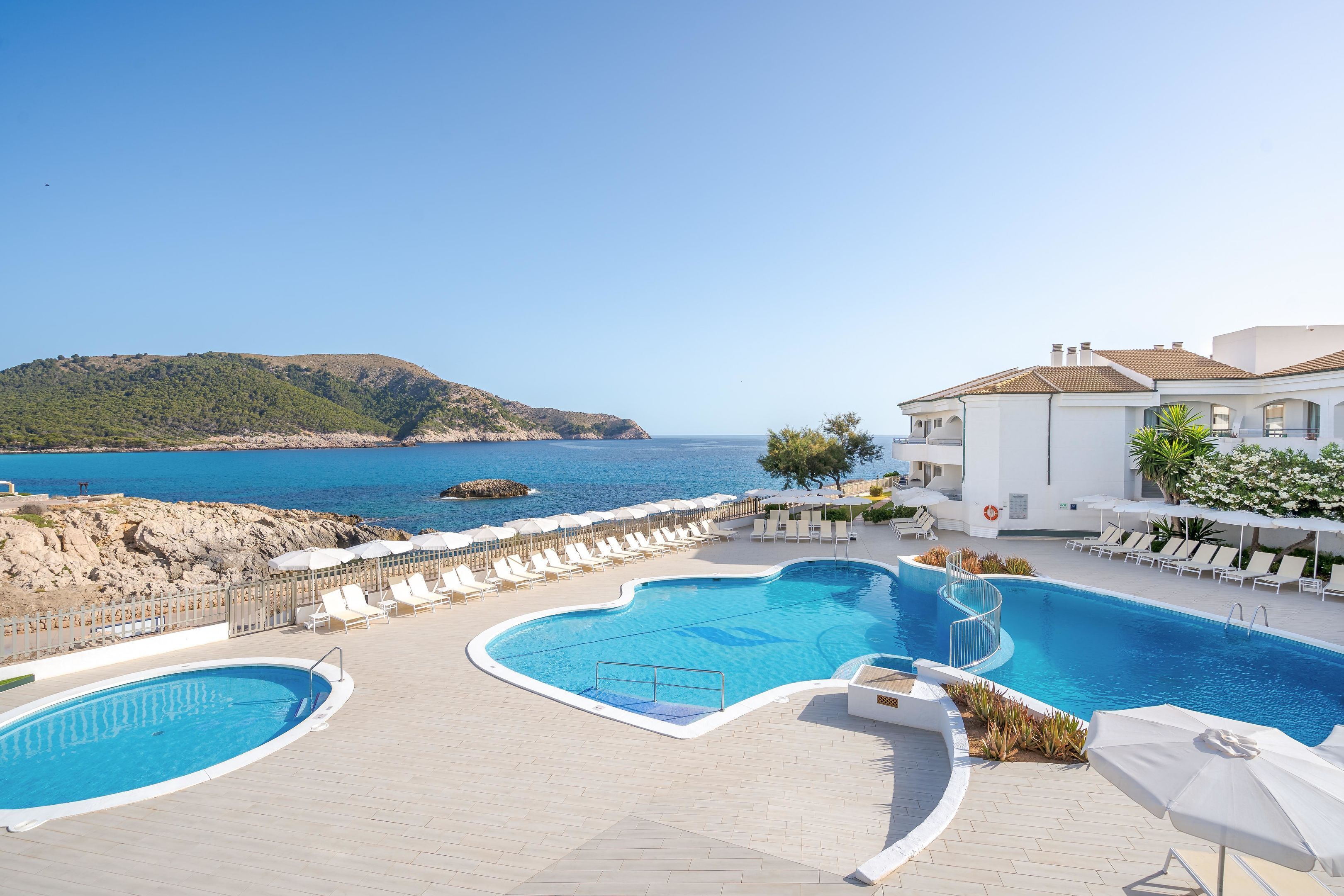 Indoor pool, outdoor pool, pool umbrellas, sun loungers