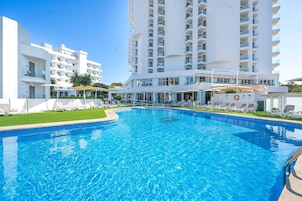 Indoor pool, outdoor pool, pool umbrellas, sun loungers
