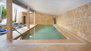 Indoor pool, outdoor pool, pool umbrellas, sun loungers