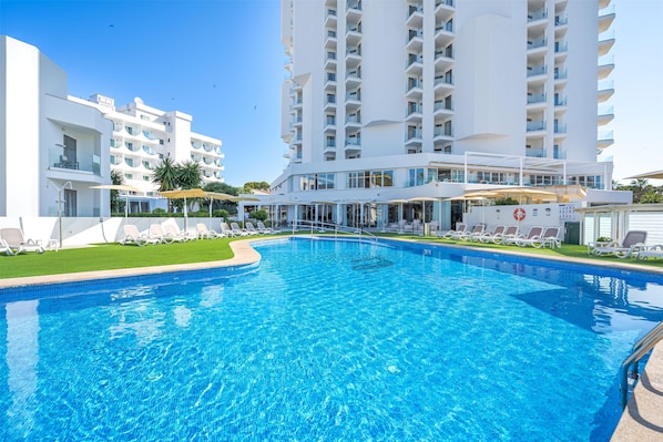 Indoor pool, outdoor pool, pool umbrellas, sun loungers
