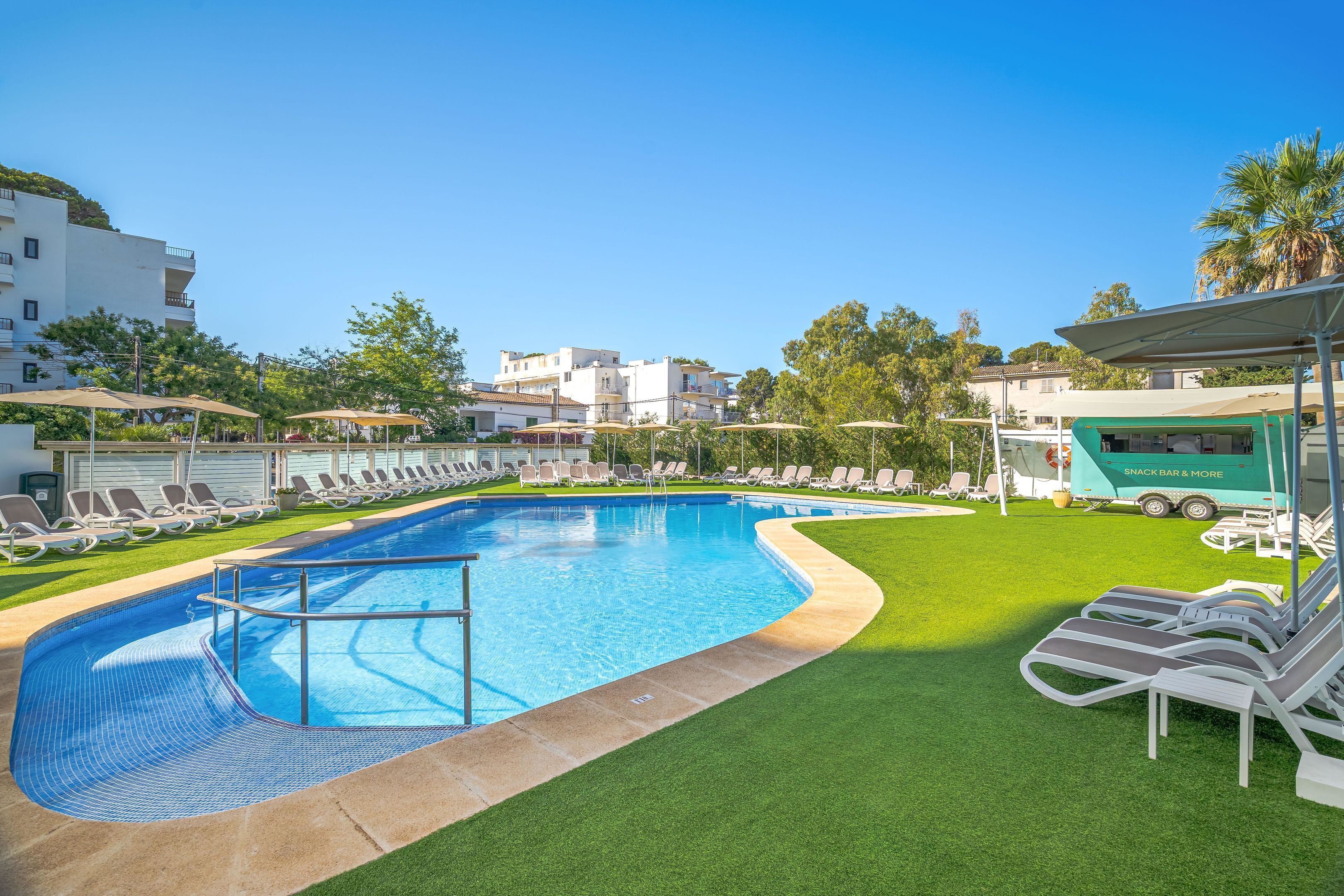 Indoor pool, outdoor pool, pool umbrellas, pool loungers