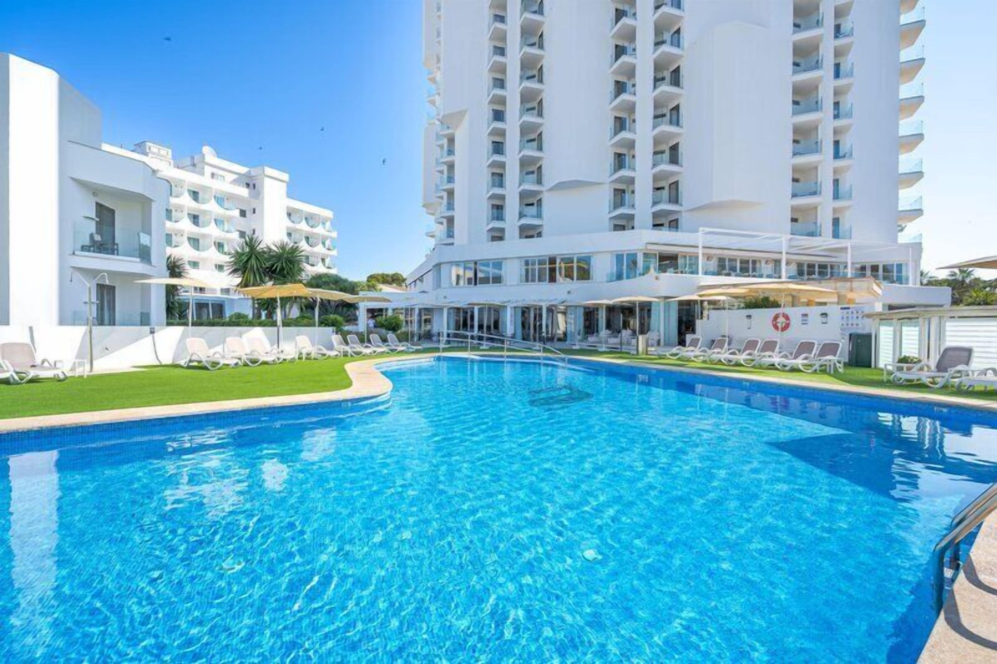 Indoor pool, outdoor pool, pool umbrellas, sun loungers