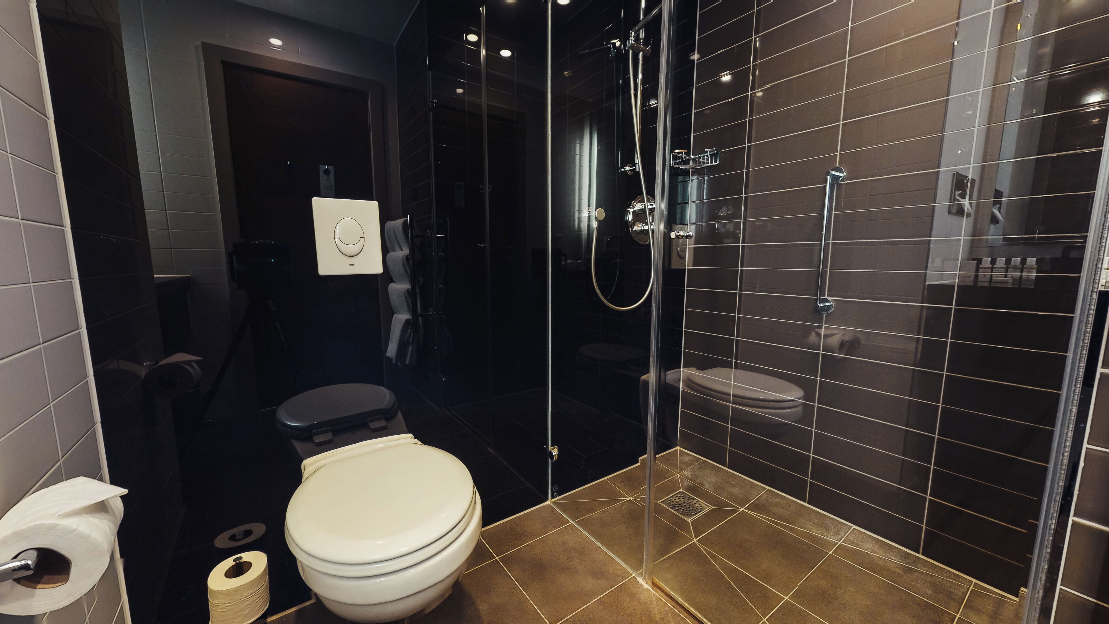 designer toiletries, hair dryer, bathrobes, slippers