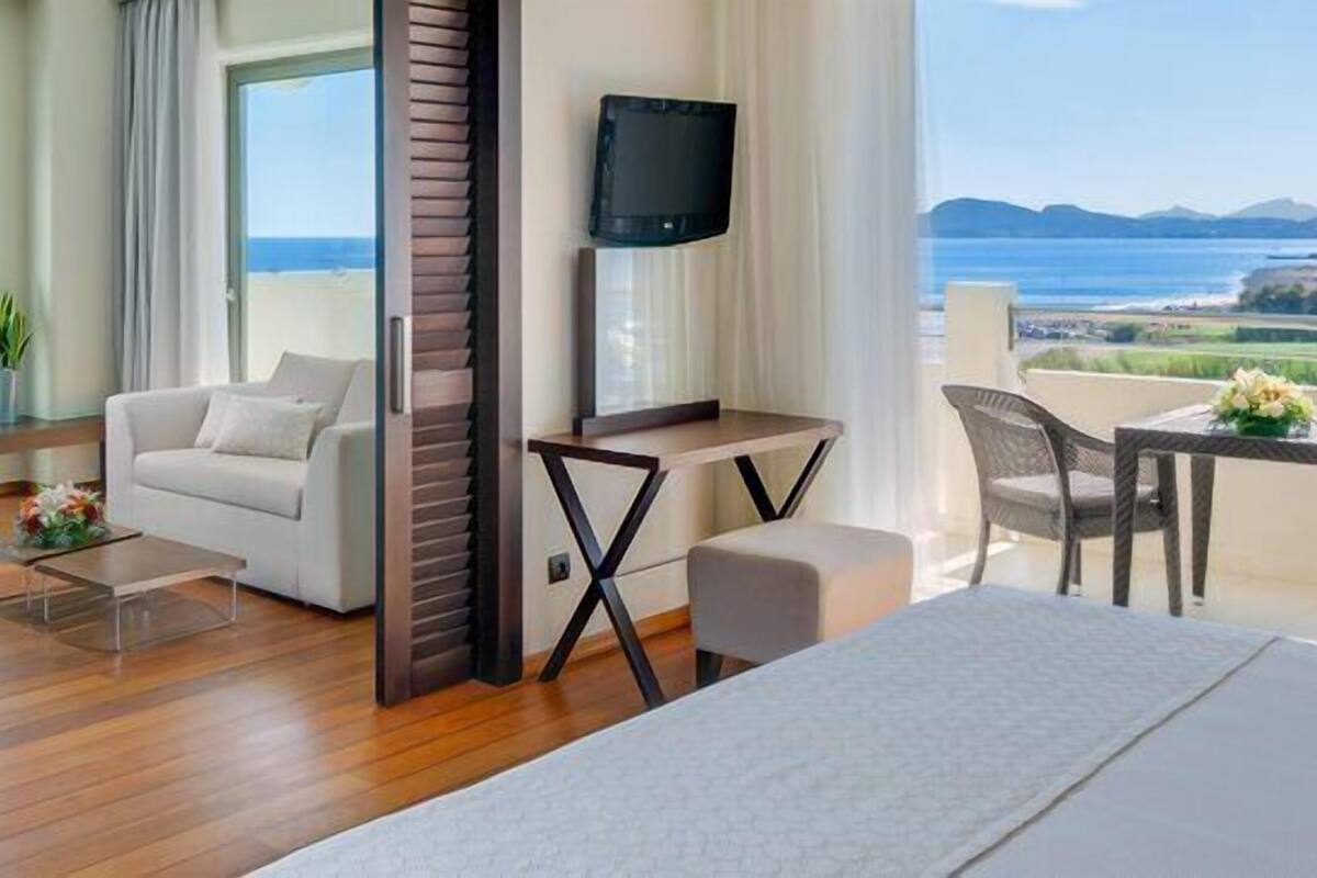Luxury Suite, Sea View (Elite Club) | Hypo-allergenic bedding, in-room safe, desk, blackout curtains