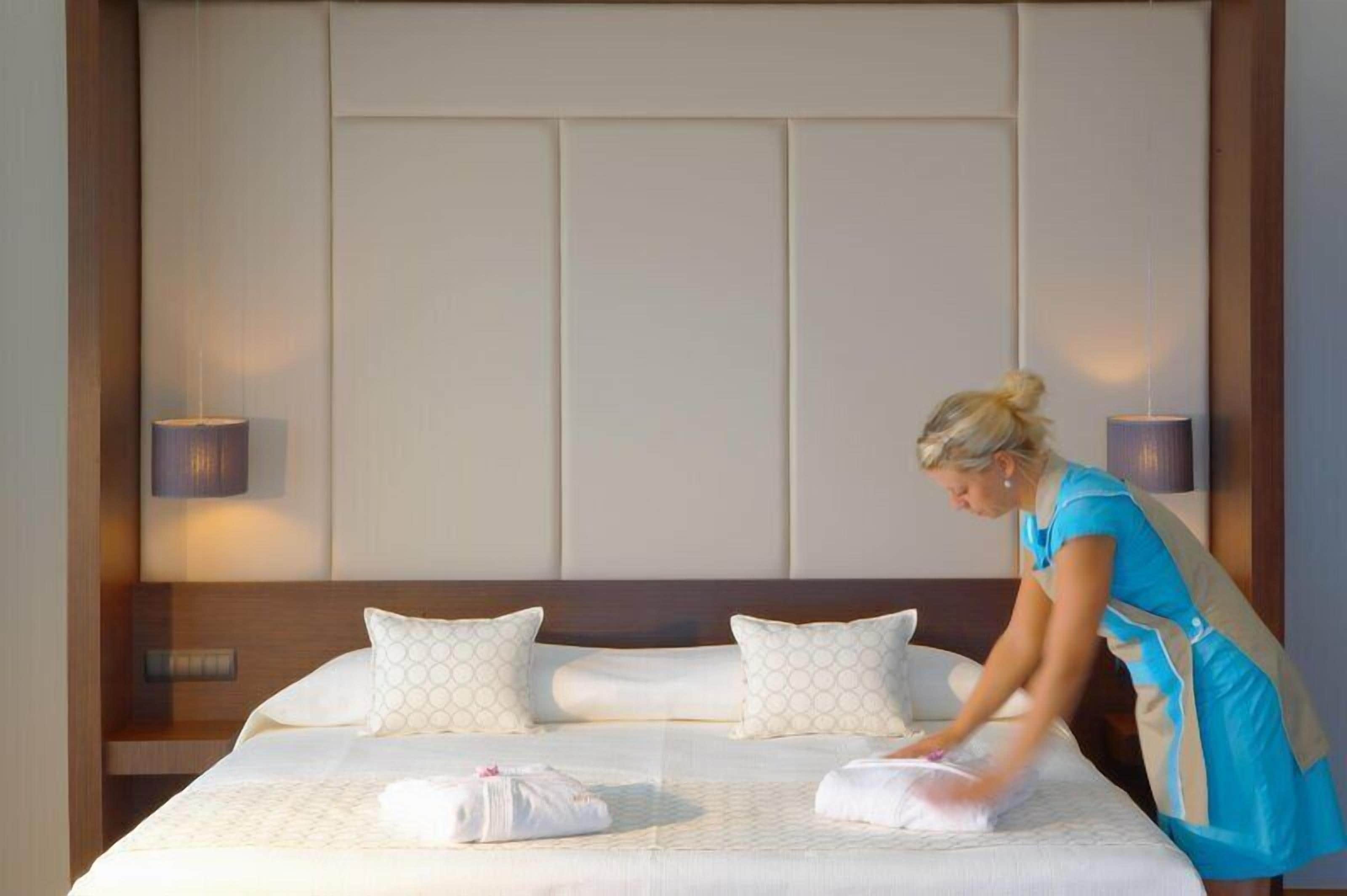 Luxury Suite, Sea View (Elite Club) | Hypo-allergenic bedding, in-room safe, desk, blackout curtains