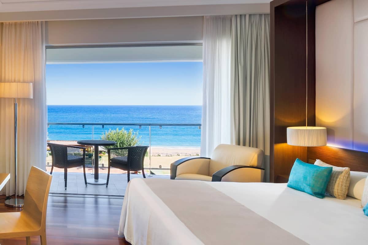 Junior Suite, Sea View (Elite Club) | Hypo-allergenic bedding, in-room safe, desk, blackout drapes