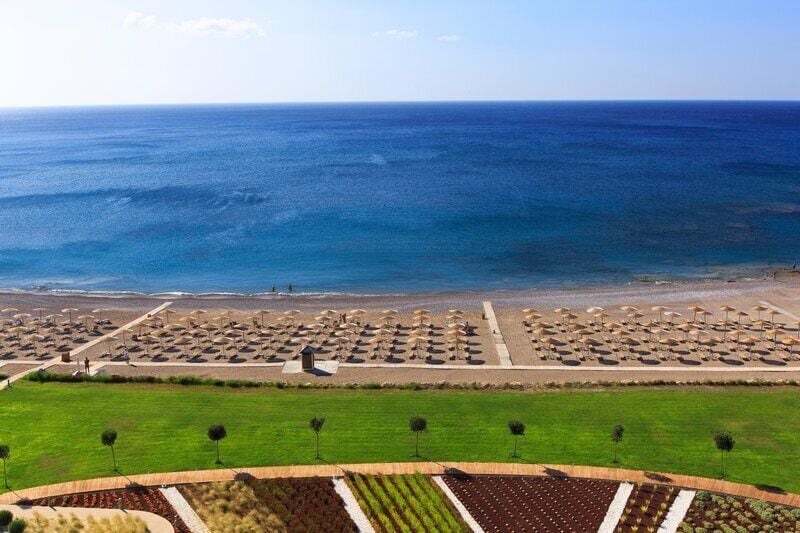 On the beach, beach cabanas, sun loungers, beach umbrellas