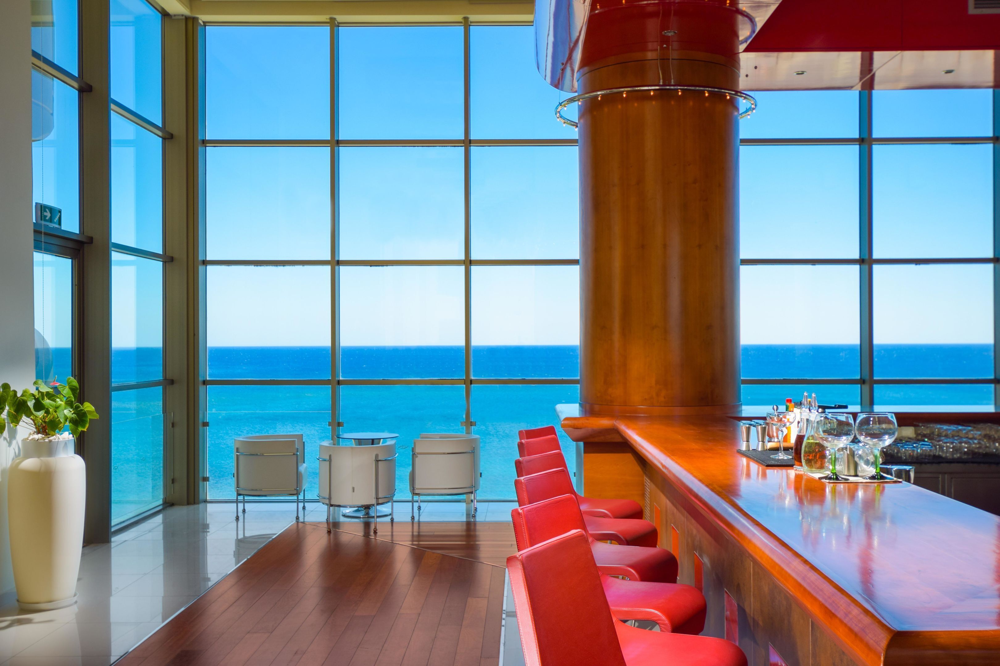 3 bars/lounges, poolside bar, beach bar