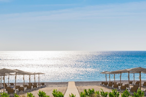 On the beach, beach cabanas, sun loungers, beach umbrellas