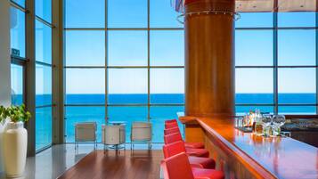 3 bars/lounges, poolside bar, beach bar