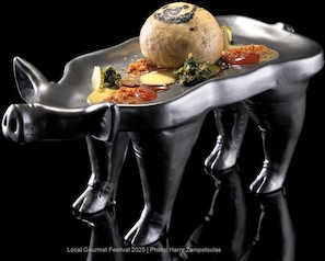 A unique dining table with a mushroom centerpiece and various dishes. - Elysium Resort & Spa (Rhodes)