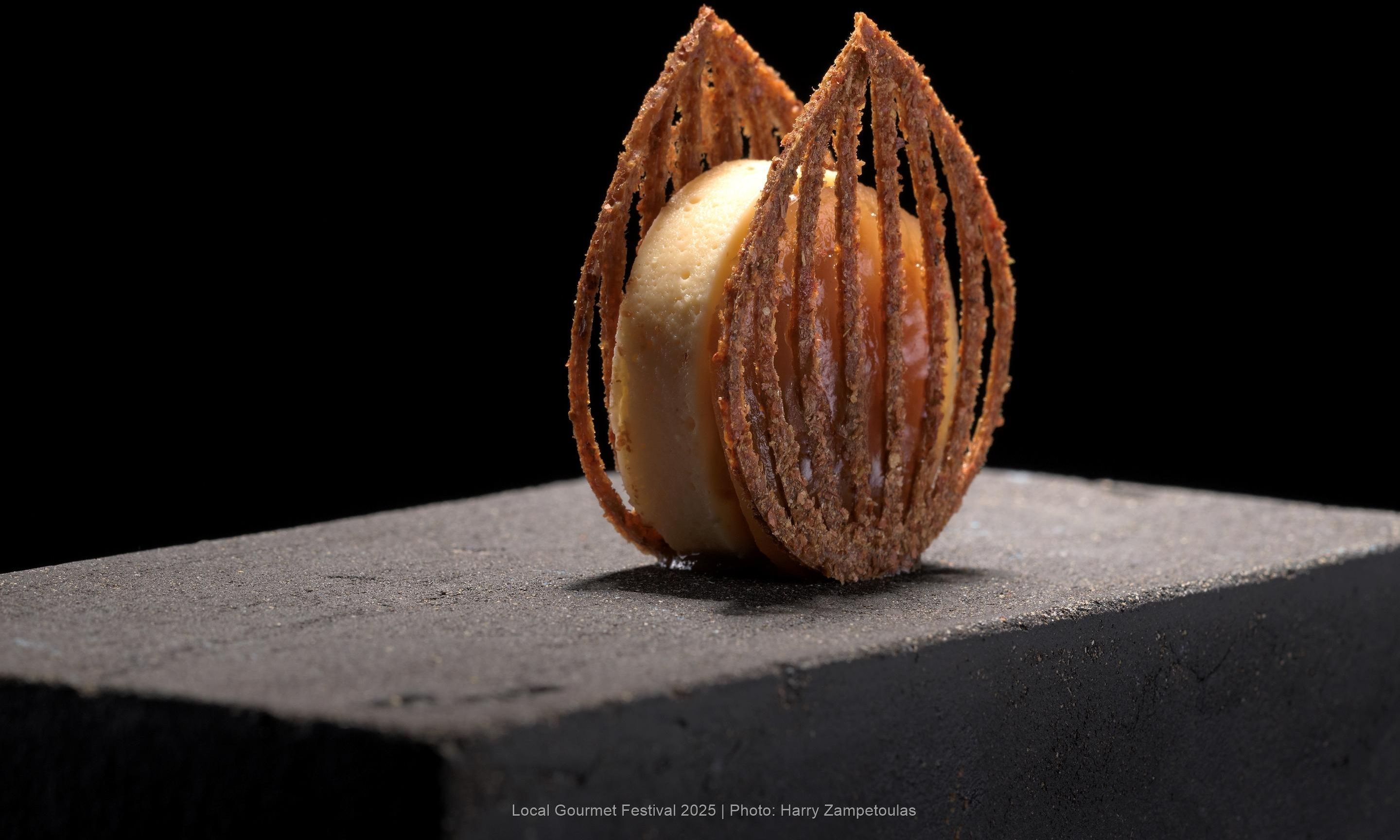A dessert on a dark surface.