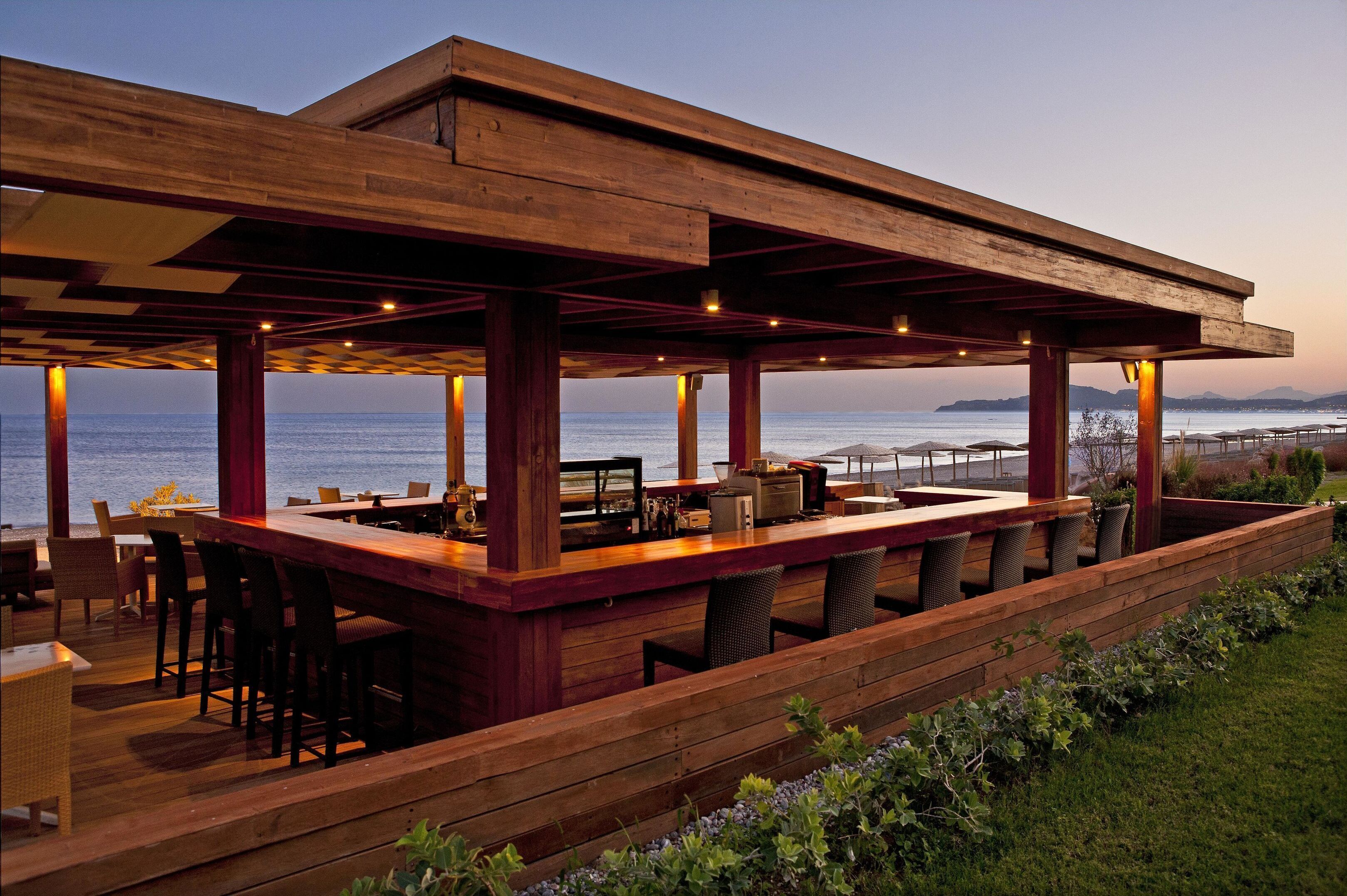 3 bars/lounges, poolside bar, beach bar