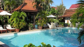 Outdoor pool, pool umbrellas, sun loungers