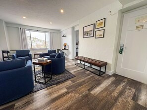 Kennecott Suite | Living area | 50-inch flat-screen TV with satellite channels, TV - Hotel Nevada (Ely)