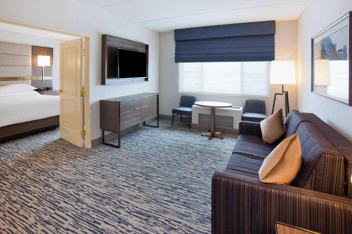 Club Suite, 1 King Bed | Living room | TV, pay movies