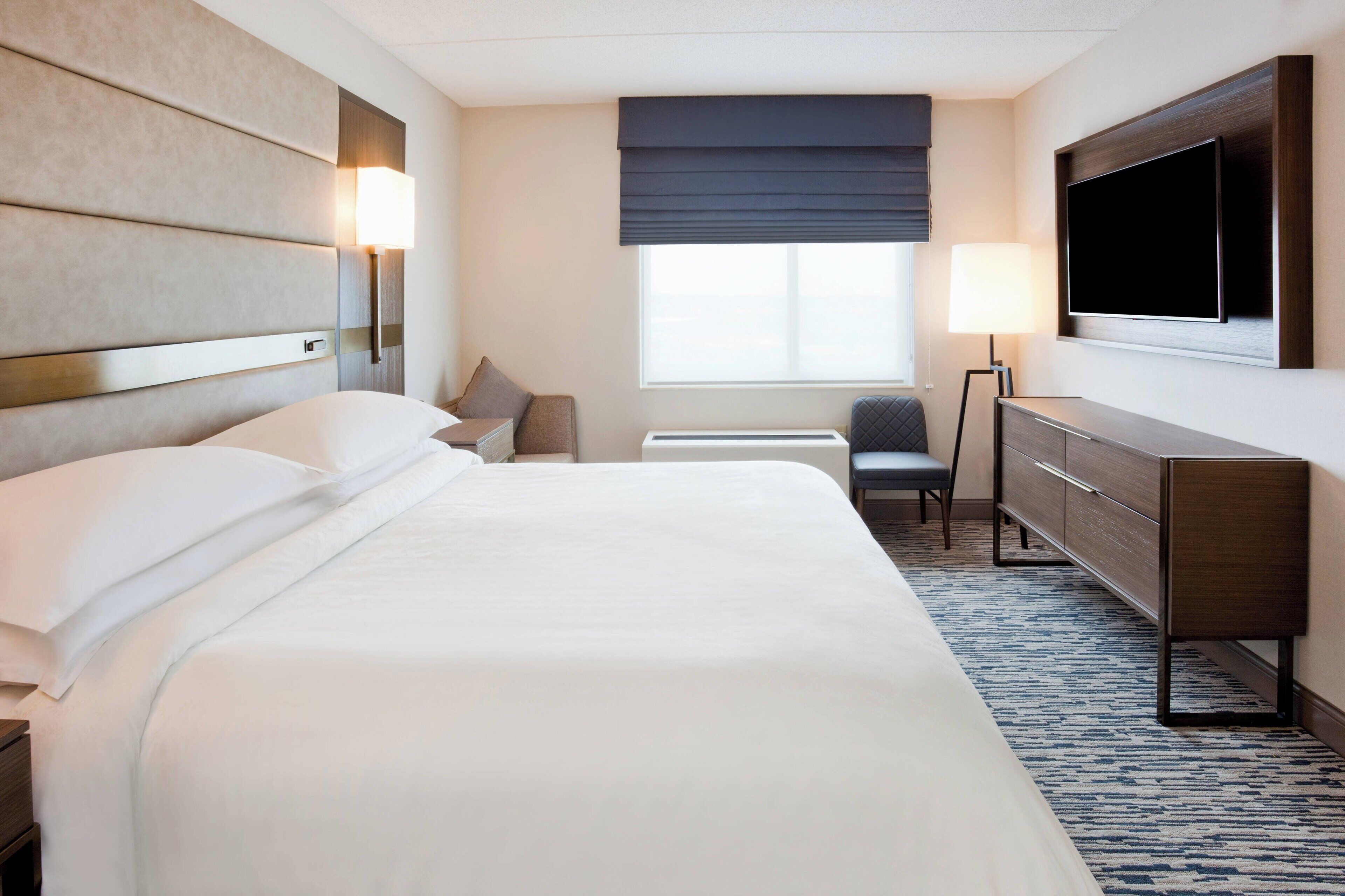 club suite, 1 king bed | premium bedding, in-room safe, desk, laptop workspace