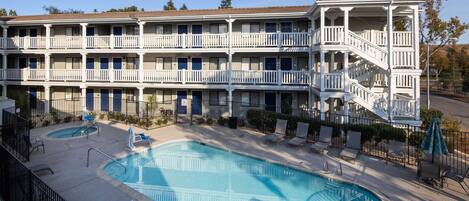 Seasonal outdoor pool, open 10 AM to 9 PM, pool umbrellas, sun loungers