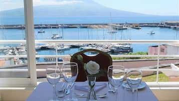 Breakfast, lunch, dinner served; pool views