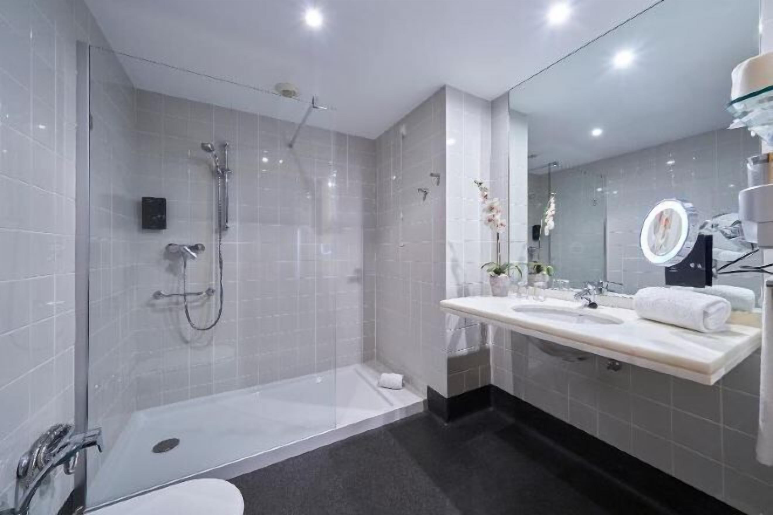 Bathroom | Shower, free toiletries, hair dryer, towels