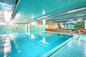 Indoor pool, outdoor pool, pool umbrellas, sun loungers