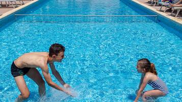Seasonal outdoor pool, pool umbrellas, sun loungers