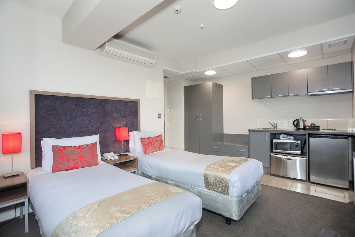 Studio, 2 Twin Beds | Premium bedding, down comforters, pillowtop beds, desk