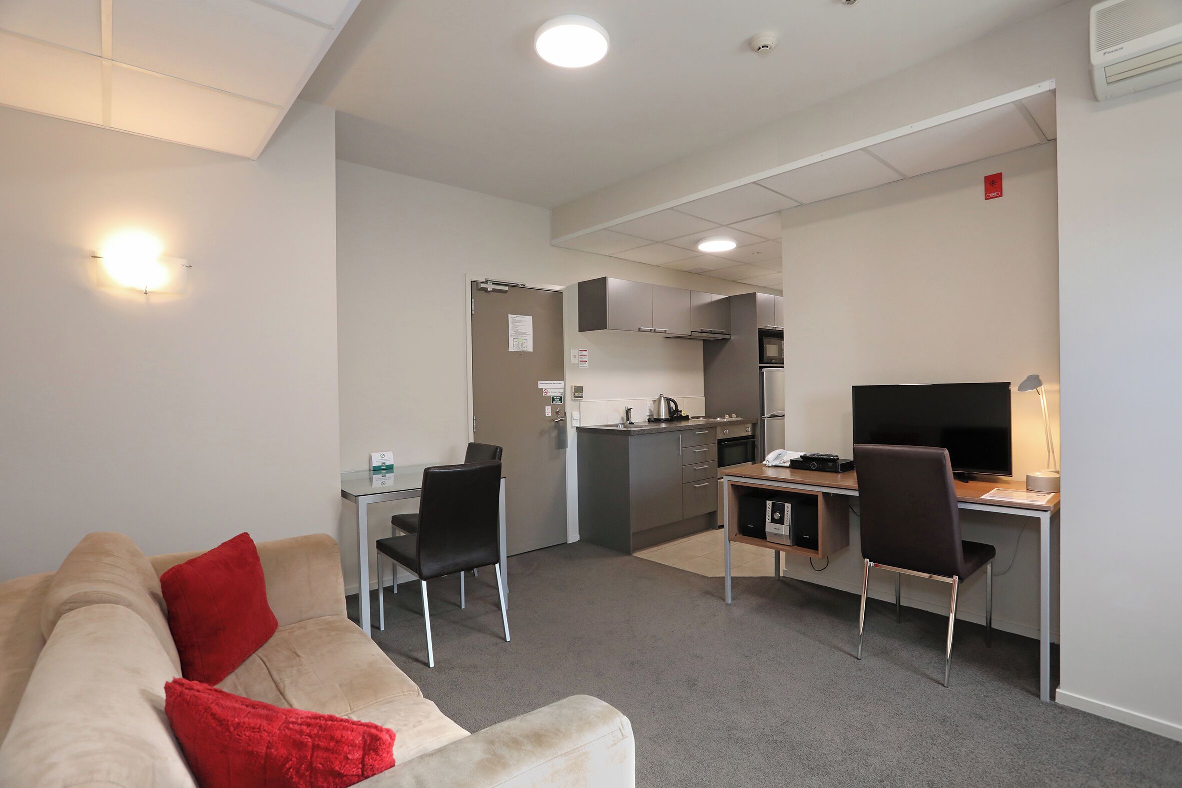 One Bedroom Apartment  | Living area | Flat-screen TV, DVD player
