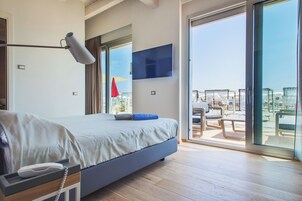 Habitación triple, vistas a la playa | Terraza o patio