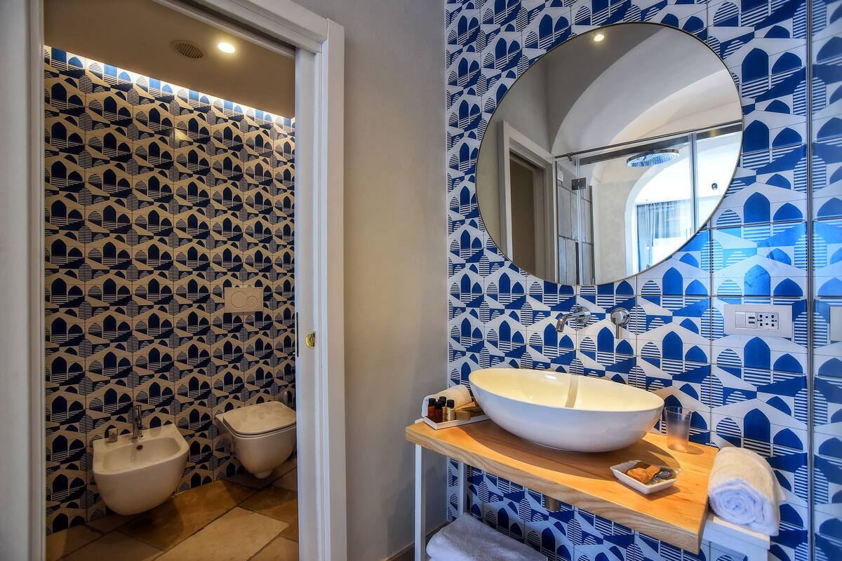 superior double room, sea view | bathroom | shower, eco-friendly toiletries, hair dryer, bathrobes