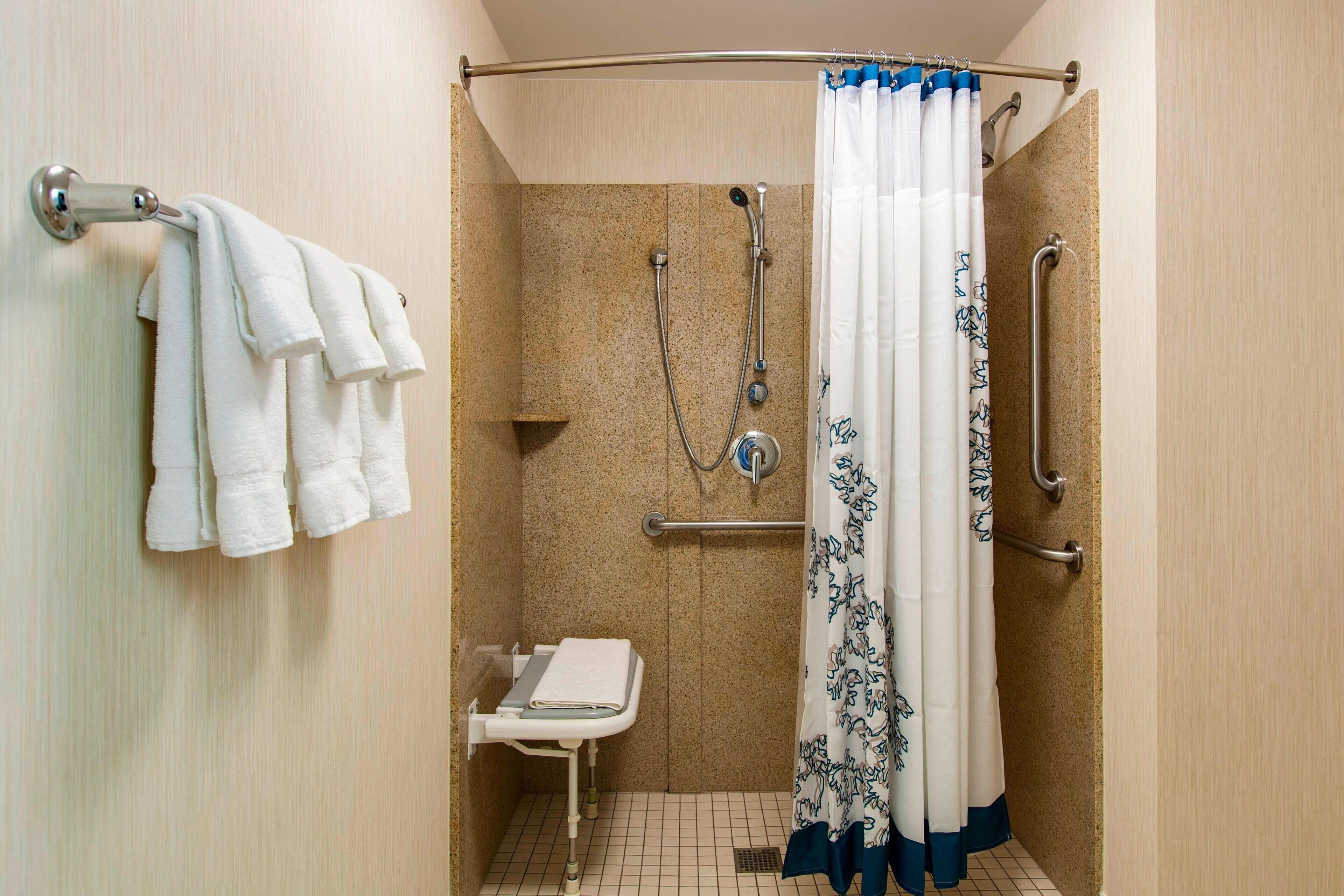 combined shower/bathtub, free toiletries, hair dryer, towels