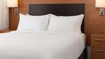 Premium bedding, pillowtop beds, desk, blackout drapes