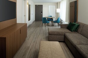 Suite, 1 Bedroom | Living area | 32-inch LCD TV with cable channels, TV, first-run films - Holiday Inn & Suites Montreal Airport by IHG (Montreal)