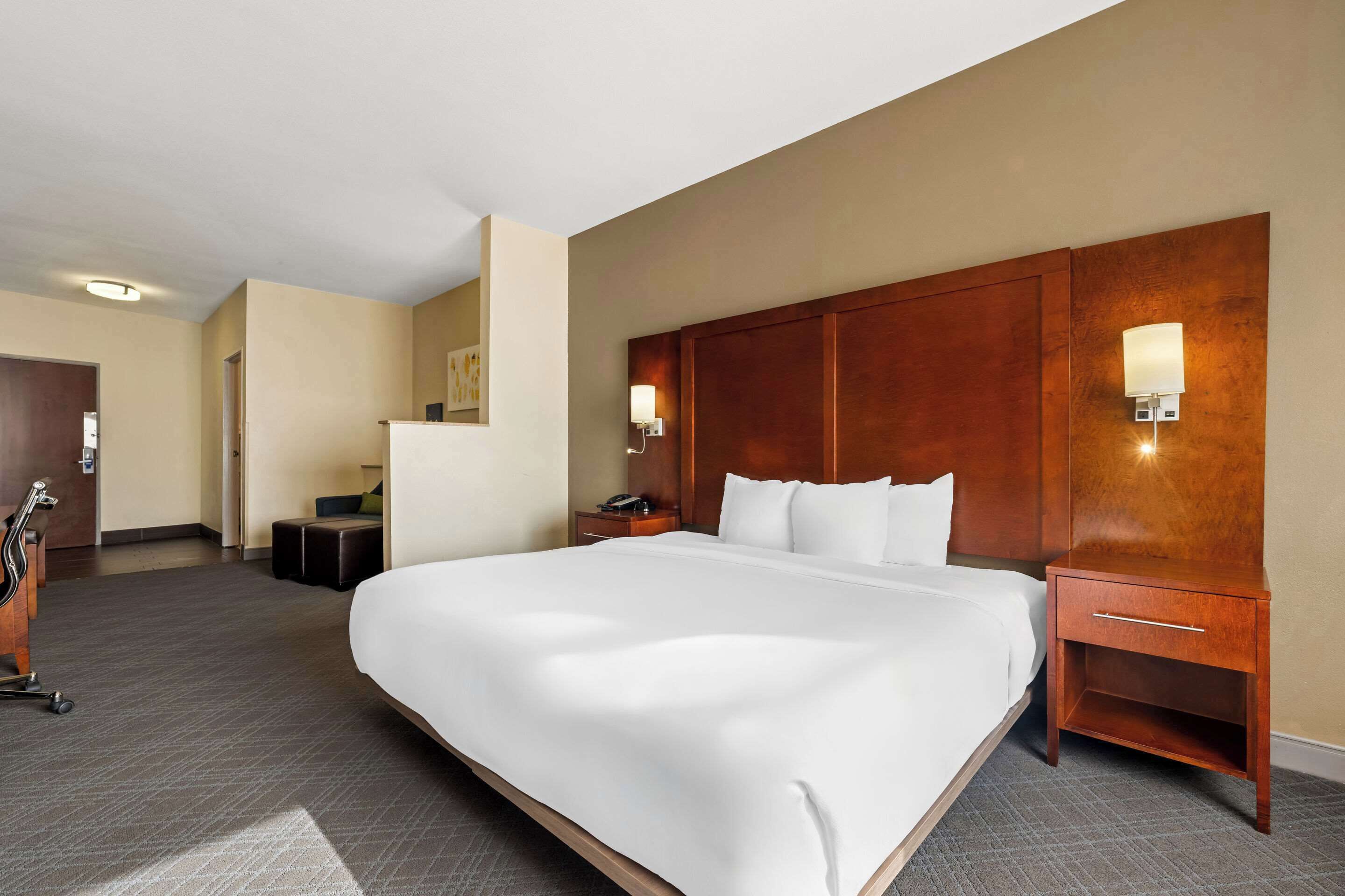 premium bedding, desk, blackout curtains, iron/ironing board