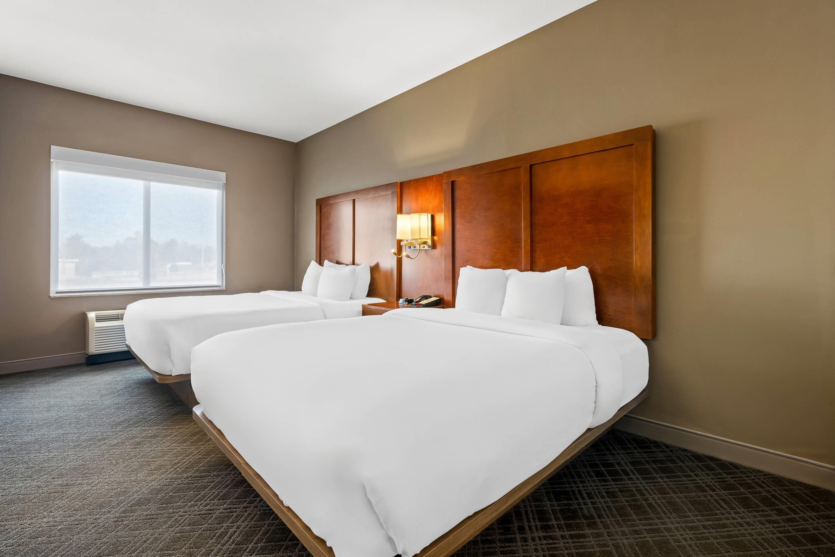 Suite, Non Smoking | Premium bedding, desk, blackout drapes, iron/ironing board