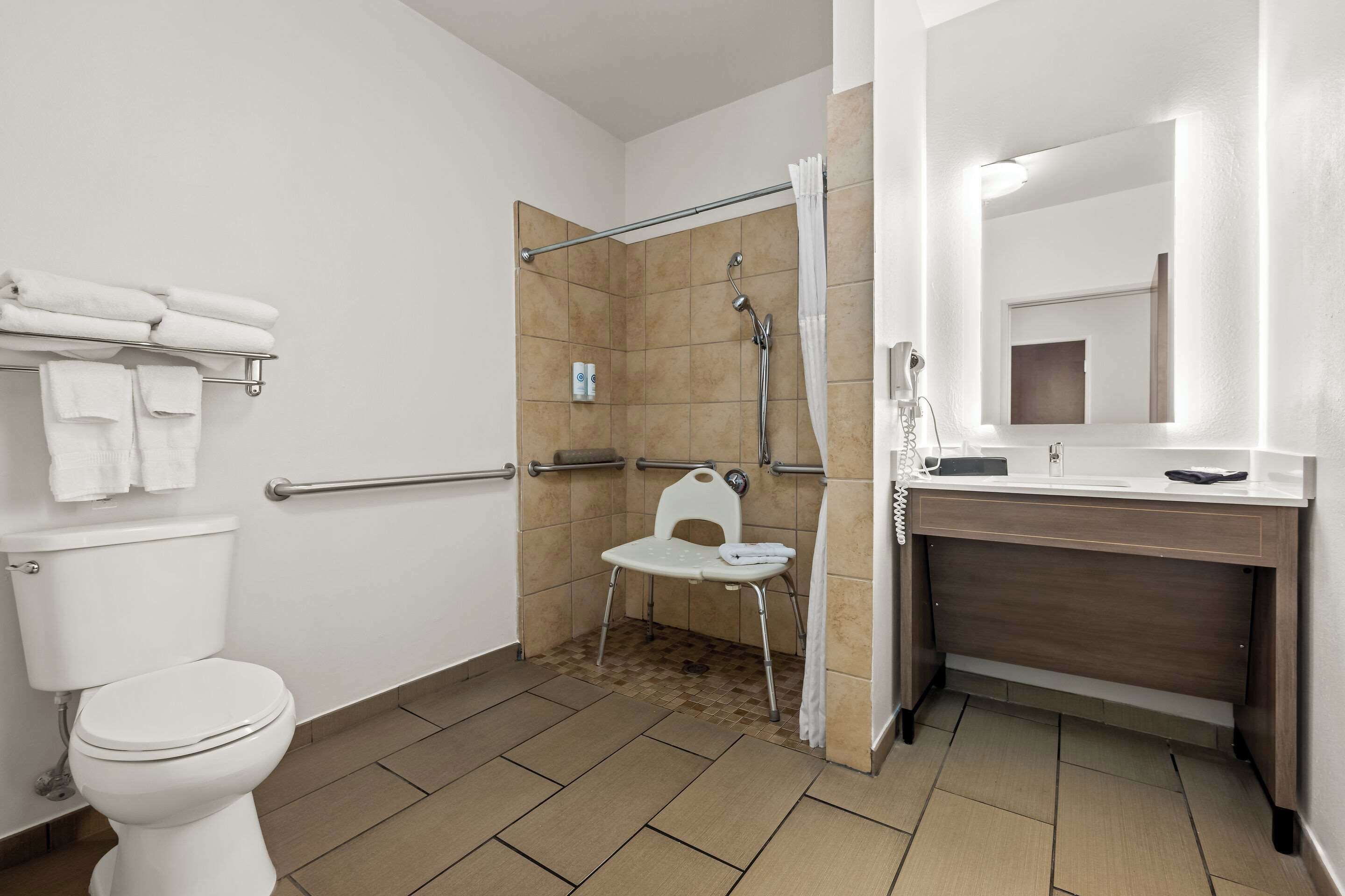 suite, 1 king bed with sofa bed, accessible, non smoking | premium bedding, desk, blackout curtains, iron/ironing board