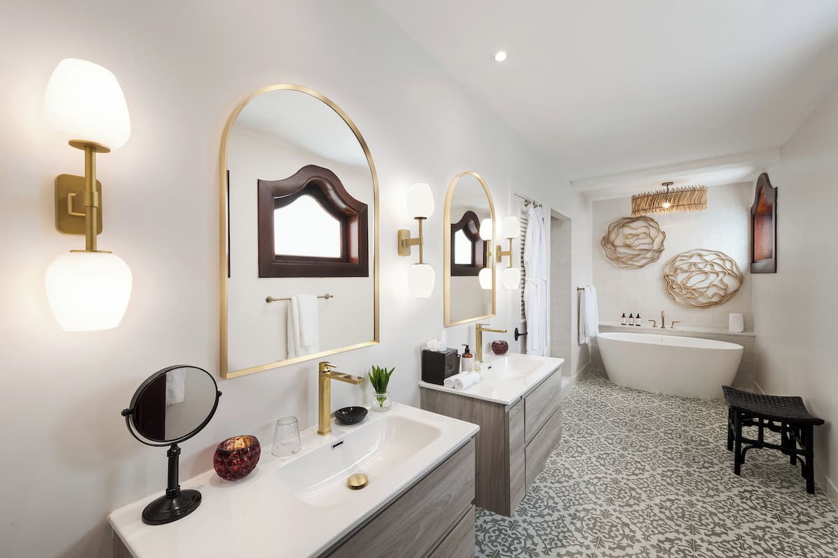 designer toiletries, hair dryer, bathrobes, towels