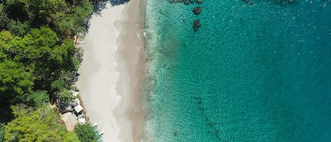 On the beach, beach umbrellas, beach towels, beach massages