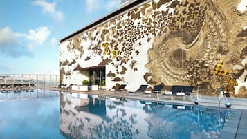 Outdoor pool, pool umbrellas, sun loungers
