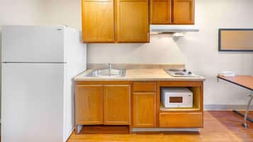 Full-sized fridge, microwave, stovetop, freezer