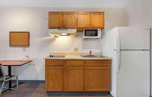 Full-sized fridge, microwave, stovetop, freezer