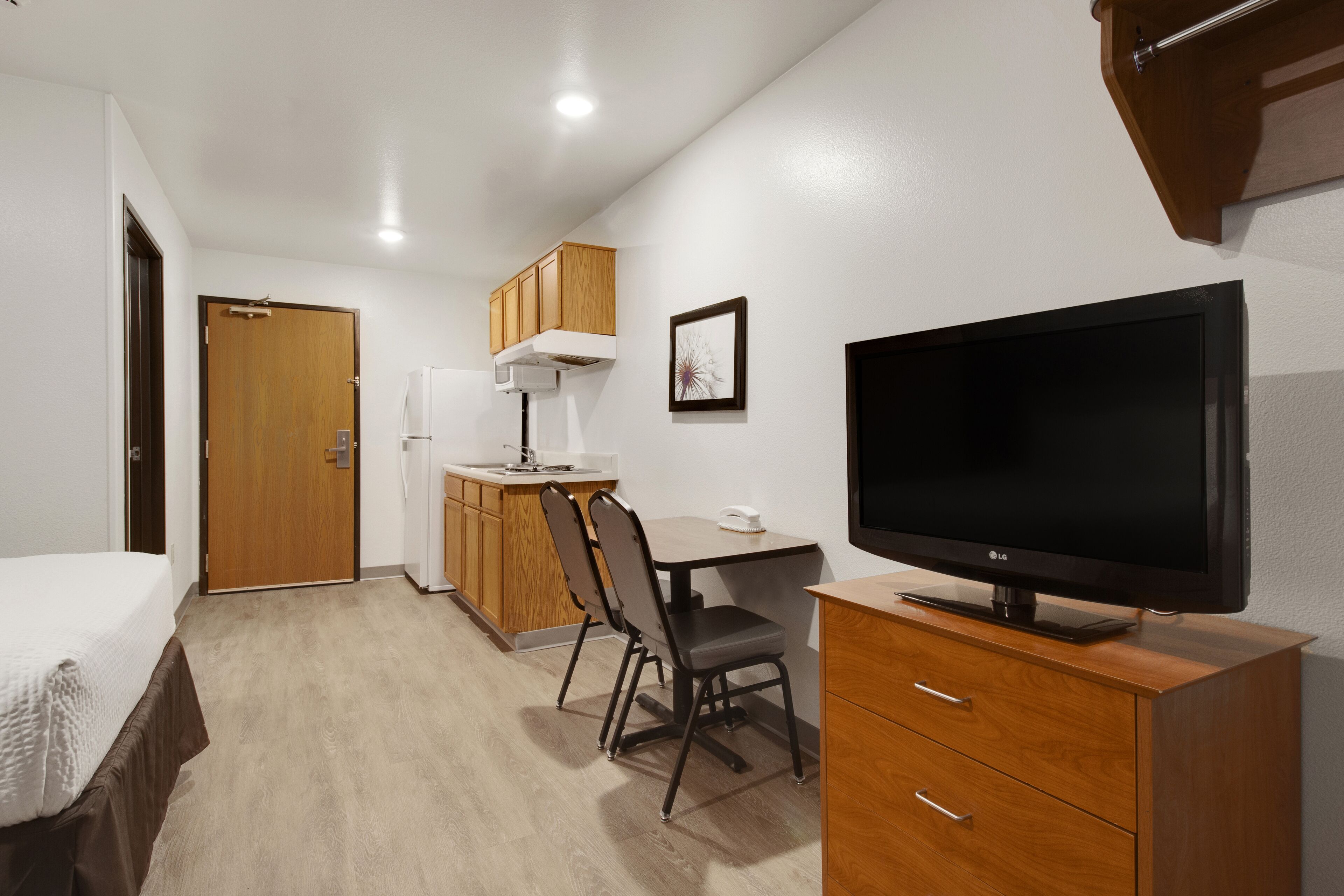 32-inch flat-screen TV with satellite channels, TV