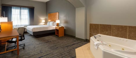 Premier Room, 1 King Bed, Jetted Tub | Premium bedding, desk, blackout drapes, iron/ironing board